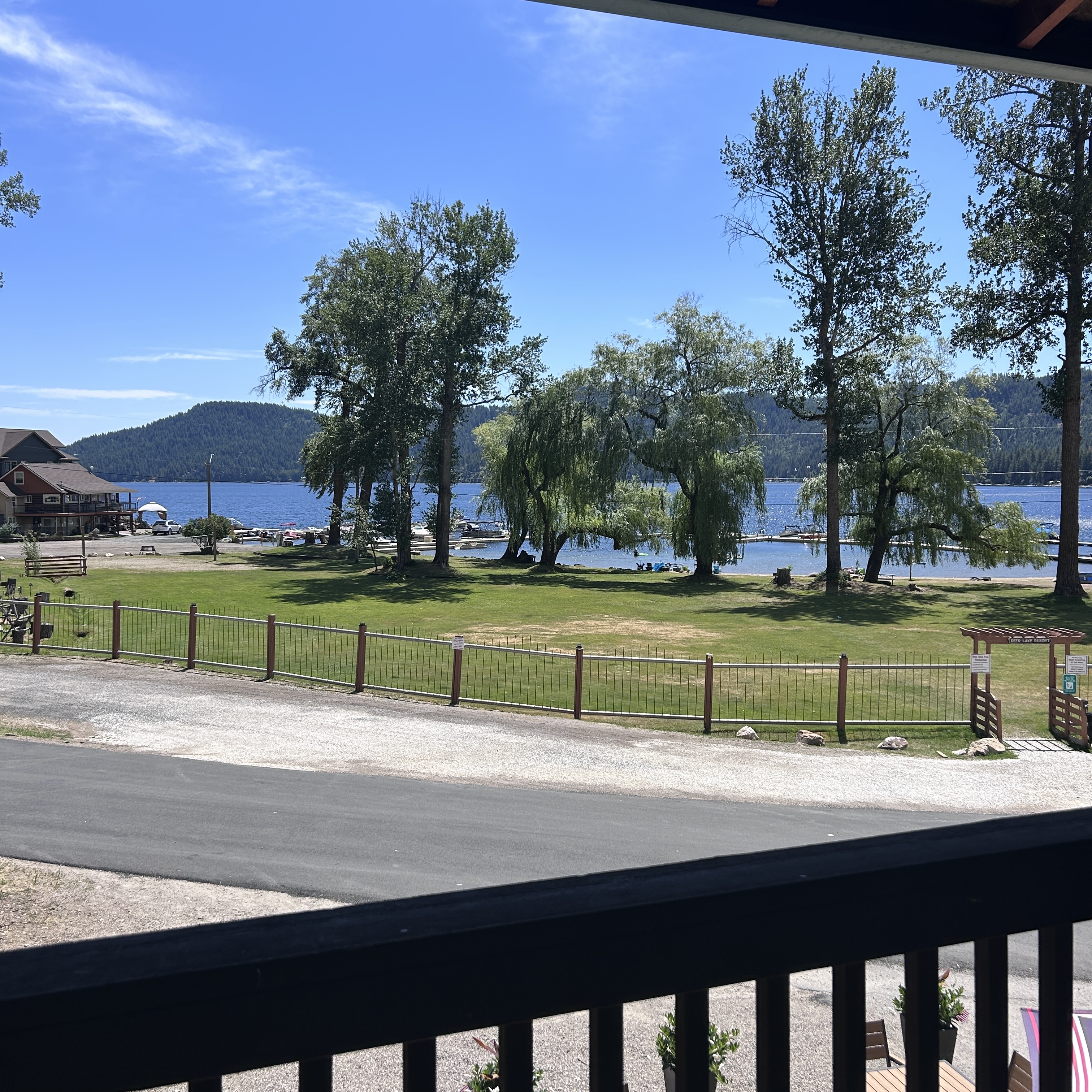 Beautiful lake view from resort deck with mountains